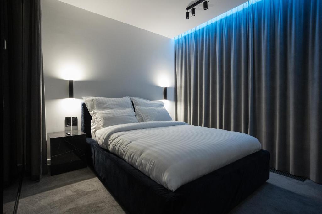 Postel nebo postele na pokoji v ubytování Apartament Zwirki
