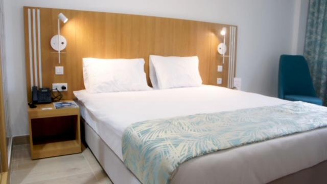 Letto o letti in una camera di Hotel Delphin-Nouadhibou