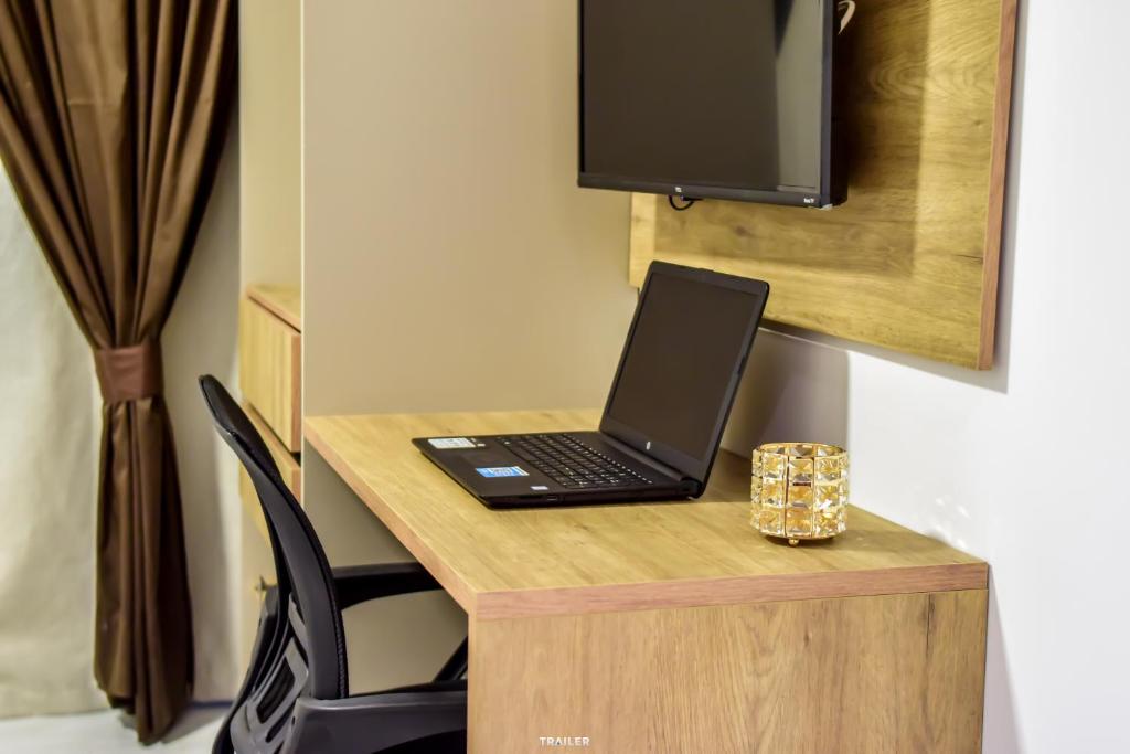 TV a/nebo společenská místnost v ubytování Hotel Aracaju Suites