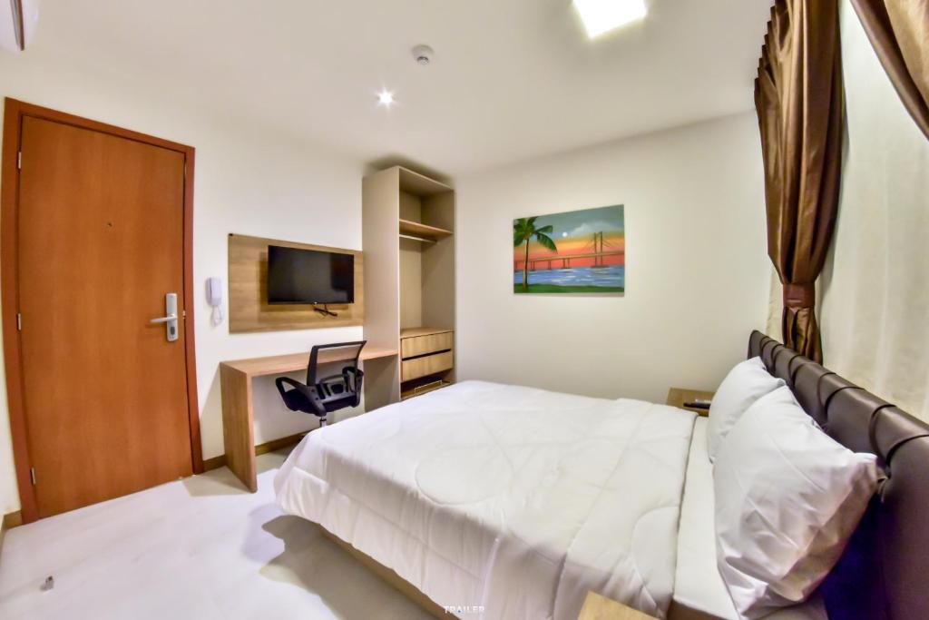 Postel nebo postele na pokoji v ubytování Hotel Aracaju Suites