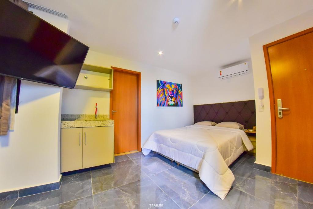 Postel nebo postele na pokoji v ubytování Hotel Aracaju Suites