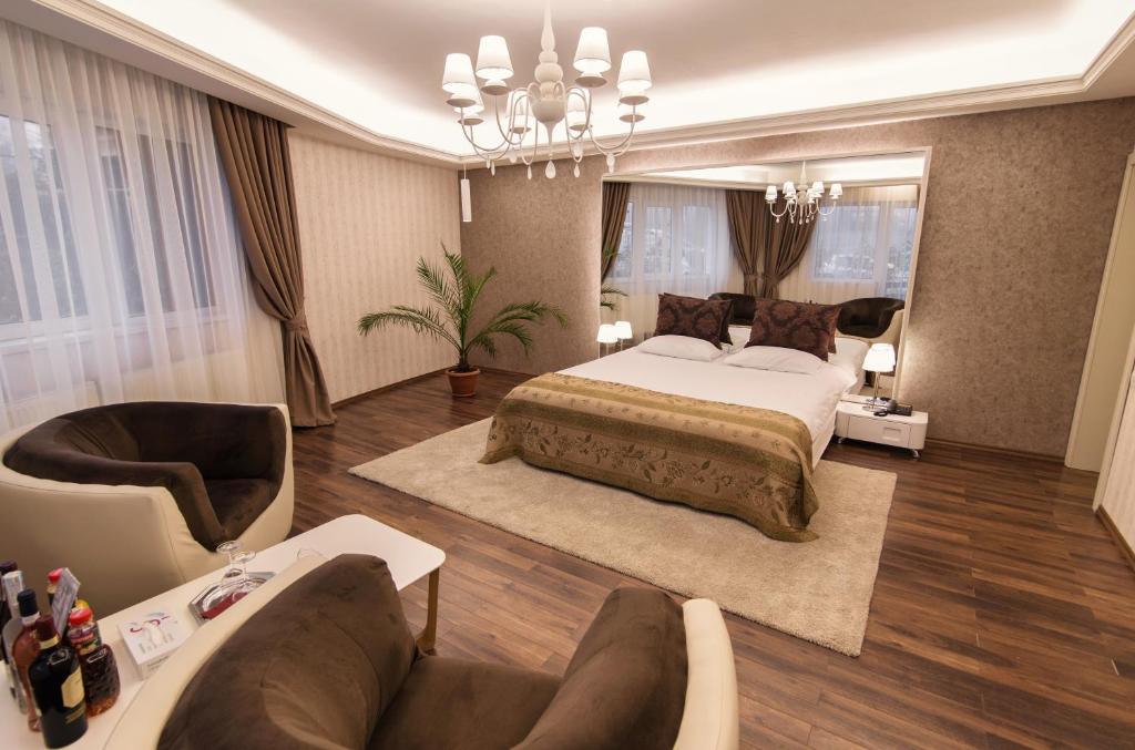 Postel nebo postele na pokoji v ubytování Hotel Belvedere