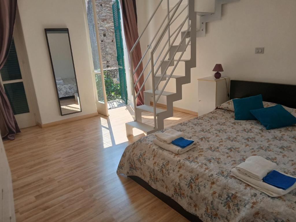 Ένα ή περισσότερα κρεβάτια σε δωμάτιο στο La Casetta di Giulia