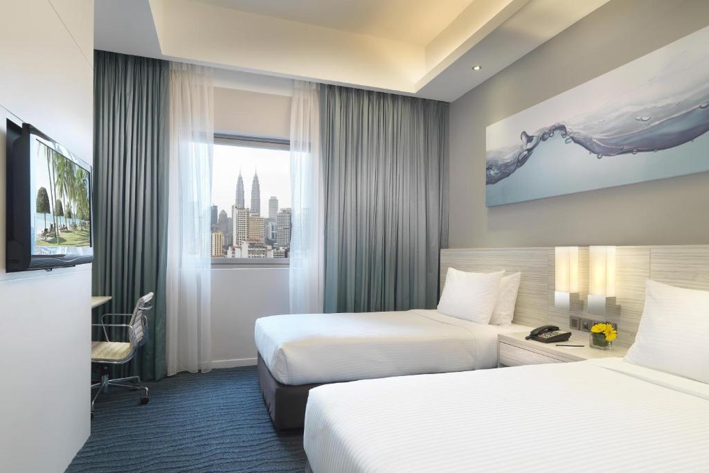 Katil atau katil-katil dalam bilik di Sunway Putra Hotel Kuala Lumpur