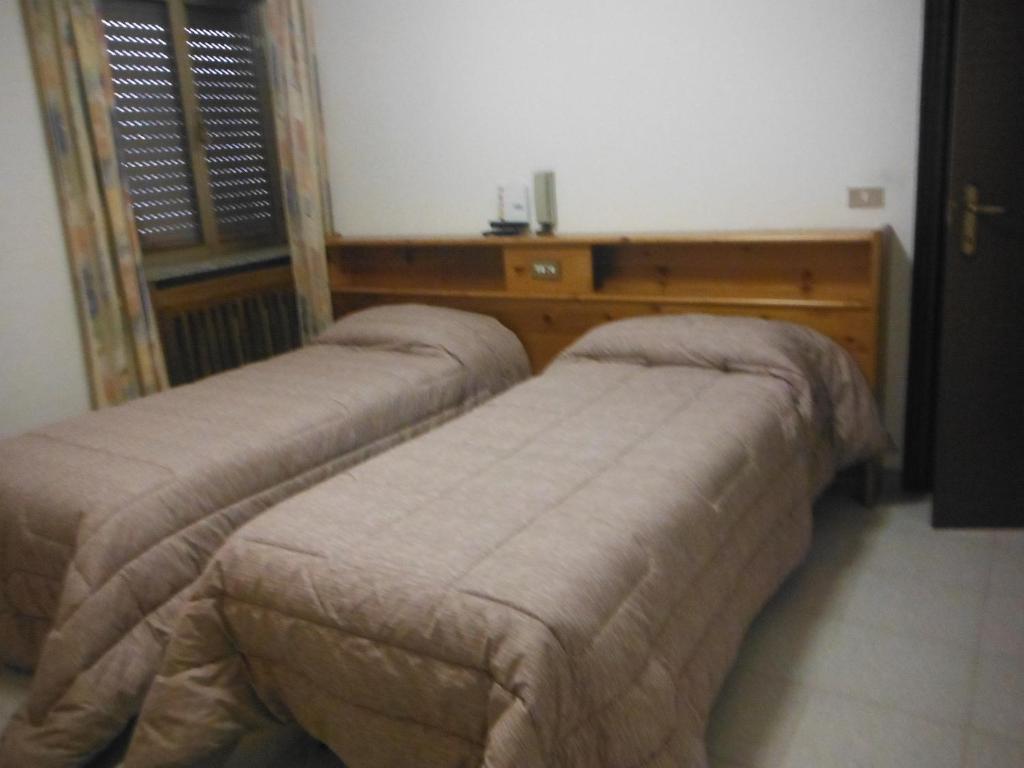 Posteľ alebo postele v izbe v ubytovaní Hotel Mochettaz
