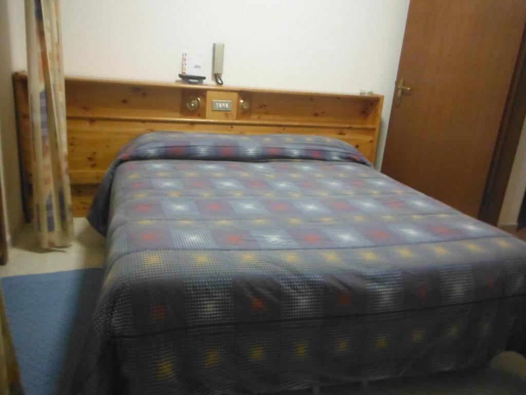 Posteľ alebo postele v izbe v ubytovaní Hotel Mochettaz