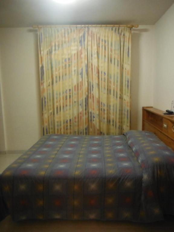 Posteľ alebo postele v izbe v ubytovaní Hotel Mochettaz
