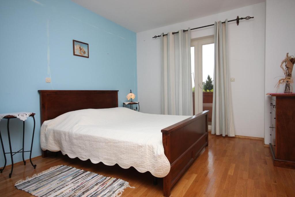 Postel nebo postele na pokoji v ubytování Apartments with a parking space Novalja, Pag - 3299