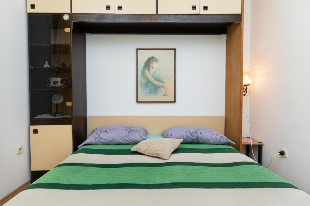 Postel nebo postele na pokoji v ubytování Apartment Mimice 2805b