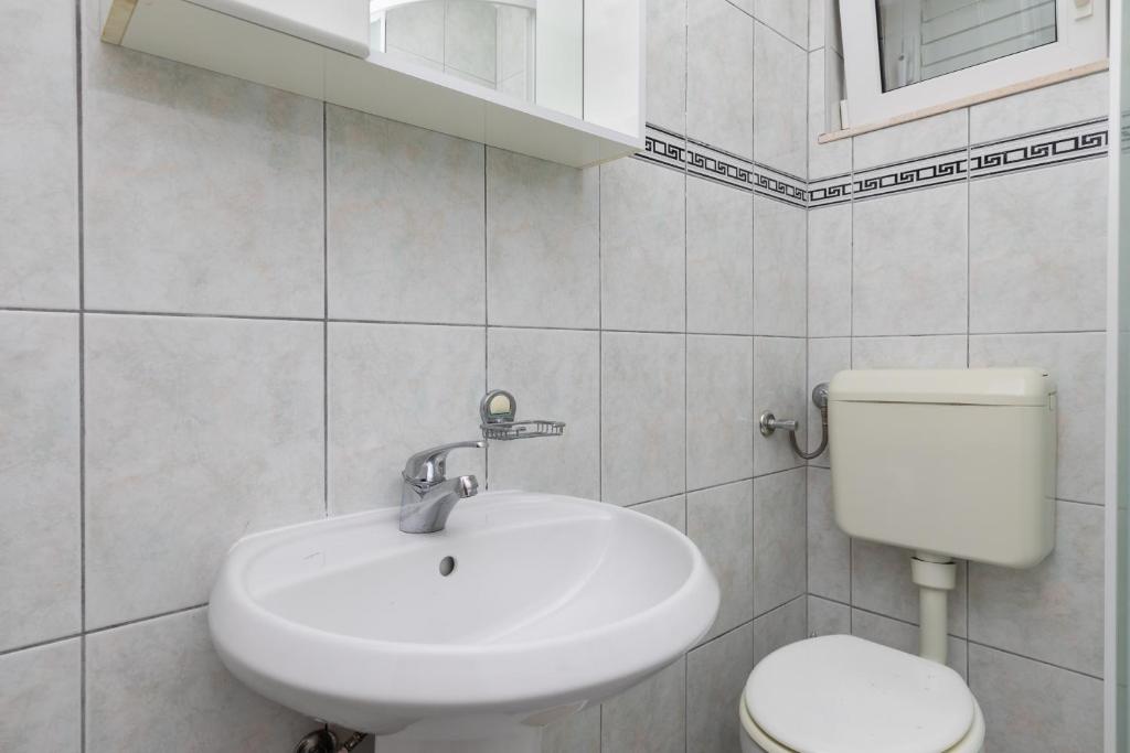 Koupelna v ubytování Apartment Mimice 2805b