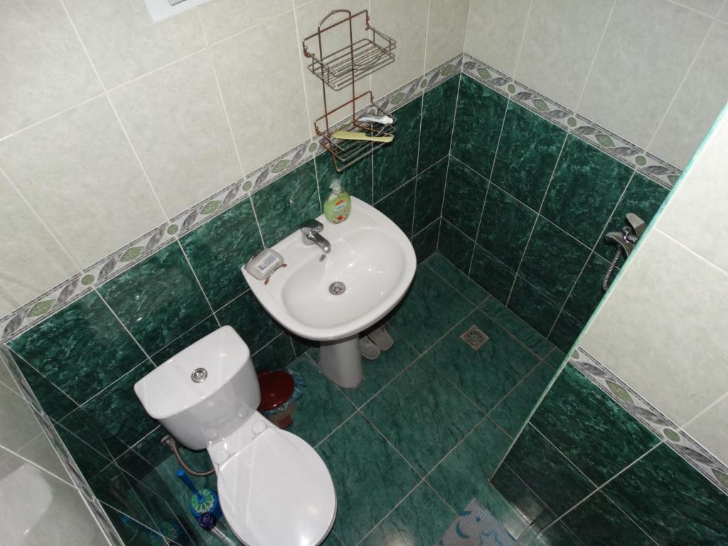 Koupelna v ubytování Hotel Sano
