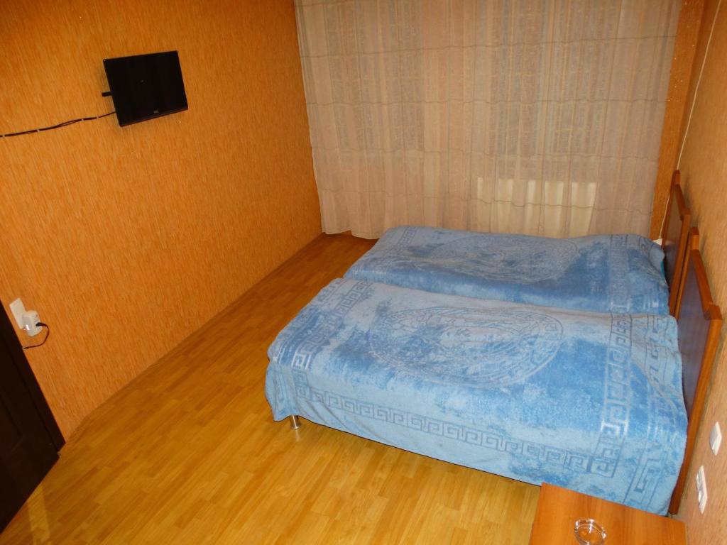 Postel nebo postele na pokoji v ubytování Hotel Sano