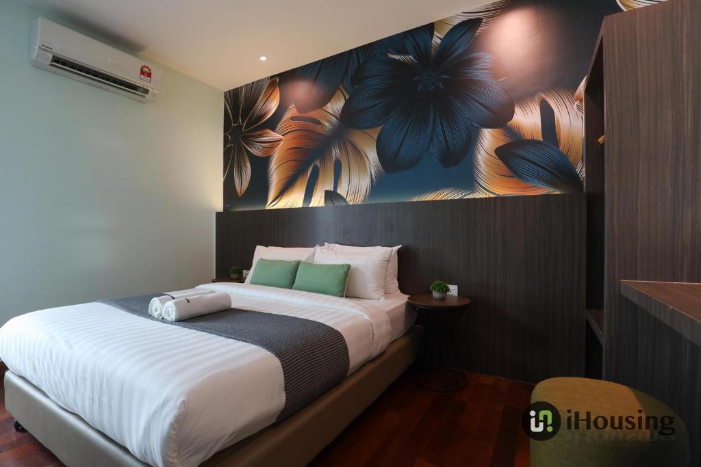 Postel nebo postele na pokoji v ubytování Trevor Hotel Malacca Town By I Housing