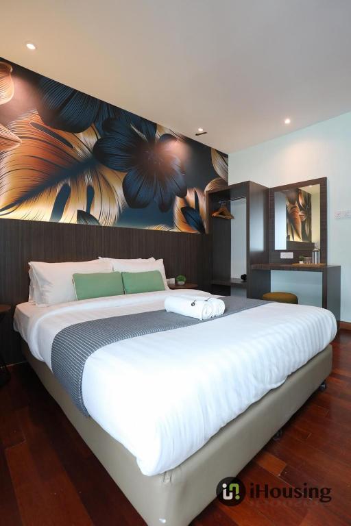 Postel nebo postele na pokoji v ubytování Trevor Hotel Malacca Town By I Housing