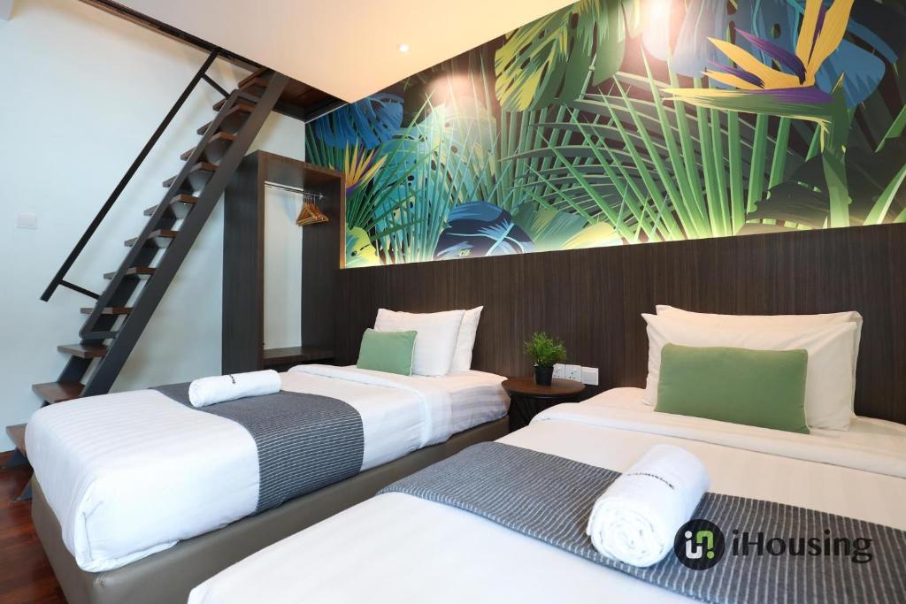 Postel nebo postele na pokoji v ubytování Trevor Hotel Malacca Town By I Housing