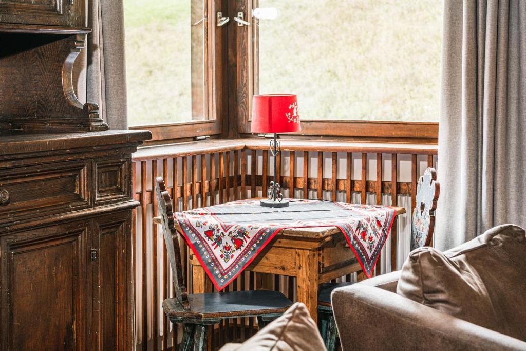 Posedenie v ubytovaní Chalet Scherlin