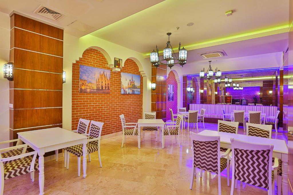 A restaurant or other place to eat at Crystal Sunset Luxury Resort & Spa - Ultimate All Inclusive