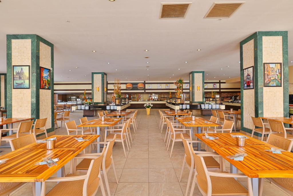 A restaurant or other place to eat at Crystal Sunset Luxury Resort & Spa - Ultimate All Inclusive
