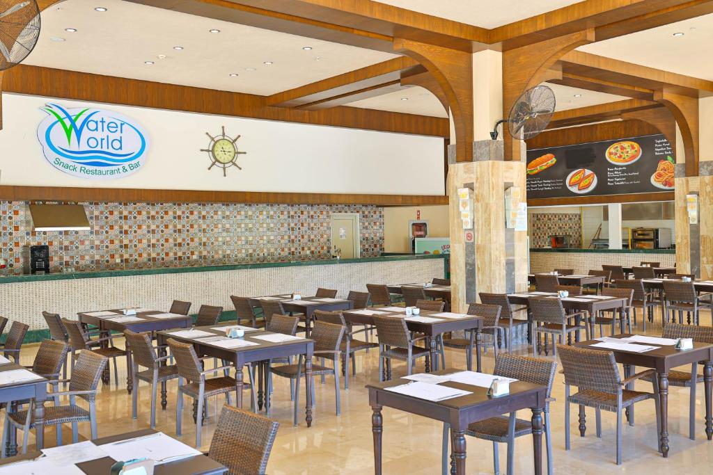 A restaurant or other place to eat at Crystal Sunset Luxury Resort & Spa - Ultimate All Inclusive
