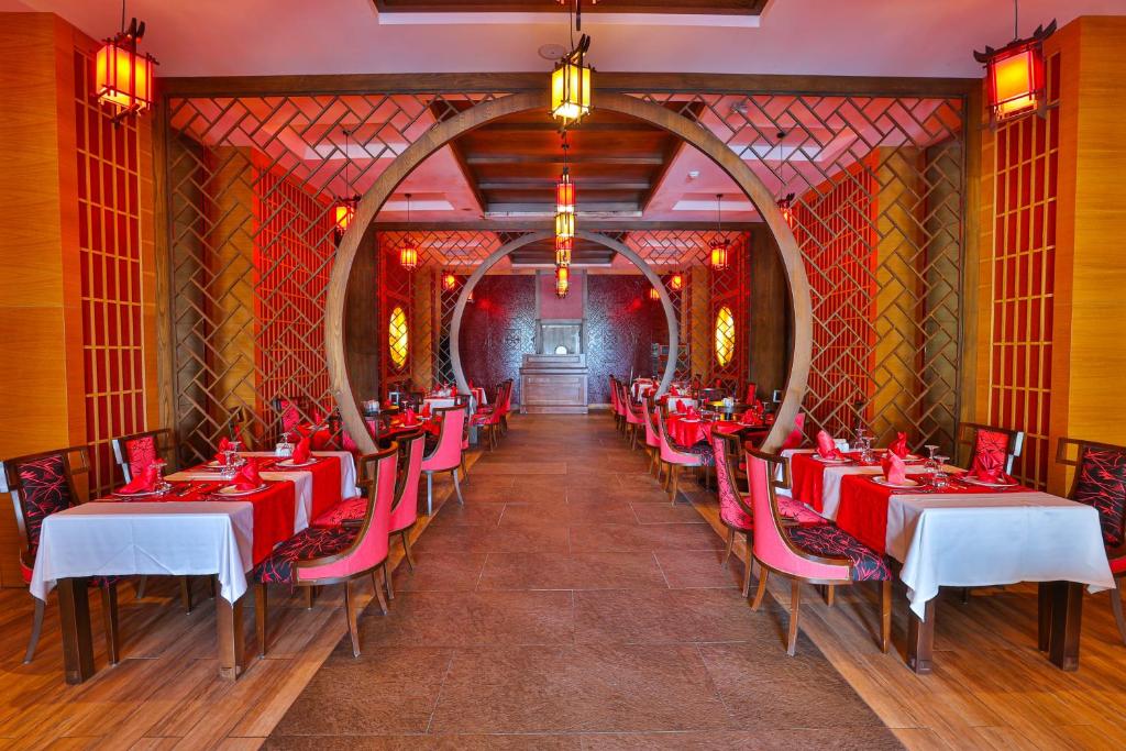 A restaurant or other place to eat at Crystal Sunset Luxury Resort & Spa - Ultimate All Inclusive