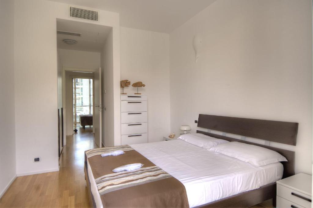 Posteľ alebo postele v izbe v ubytovaní Harbour house