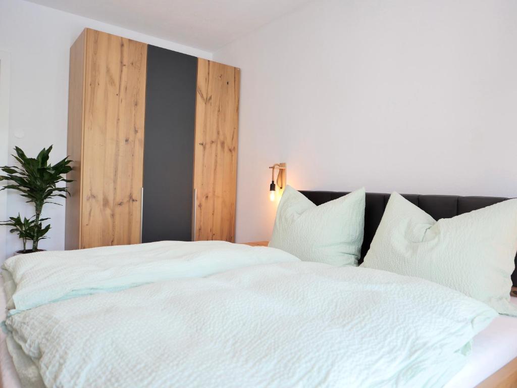 Postel nebo postele na pokoji v ubytování Apartment Auszeit