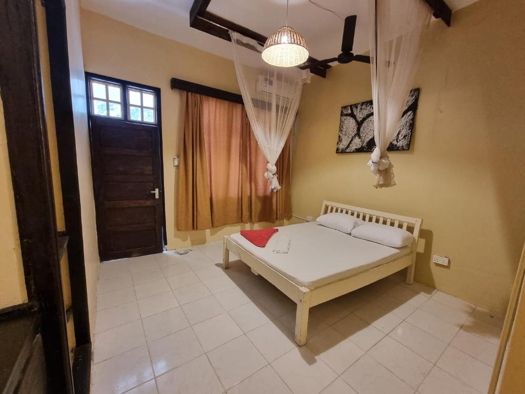 Postel nebo postele na pokoji v ubytování Tulia House Backpackers
