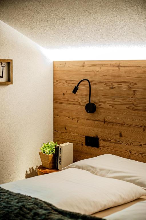 Łóżko lub łóżka w pokoju w obiekcie Pradella Apartments
