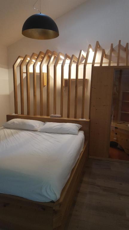 Postel nebo postele na pokoji v ubytování Masetto Egidio Eco-Agritur