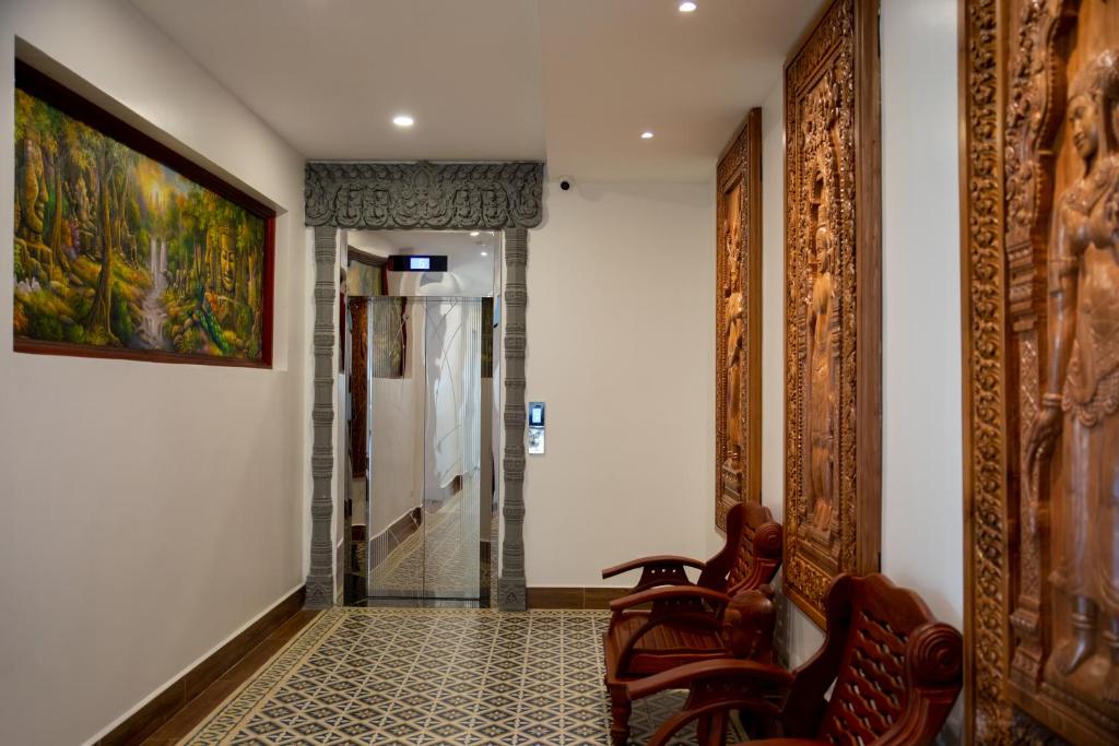 Posezení v ubytování Two Seasons Siem Reap Hotel