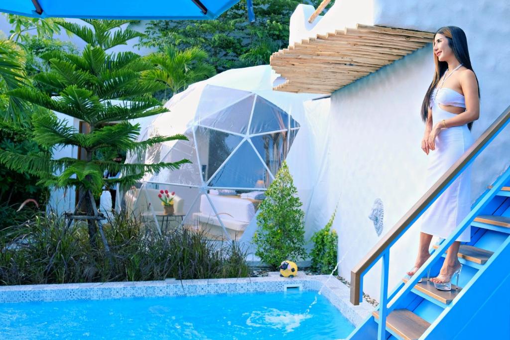 Bazén v ubytování Le Resort and Villas nebo v jeho okolí