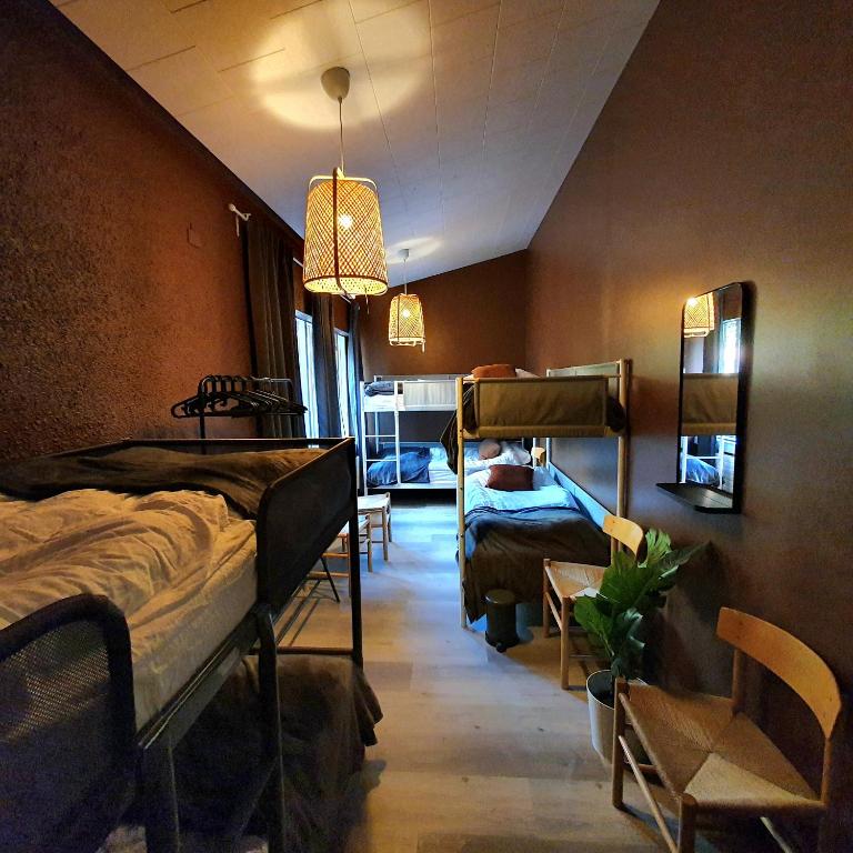 Postel nebo postele na pokoji v ubytování The Bank Sleeping Guesthouse