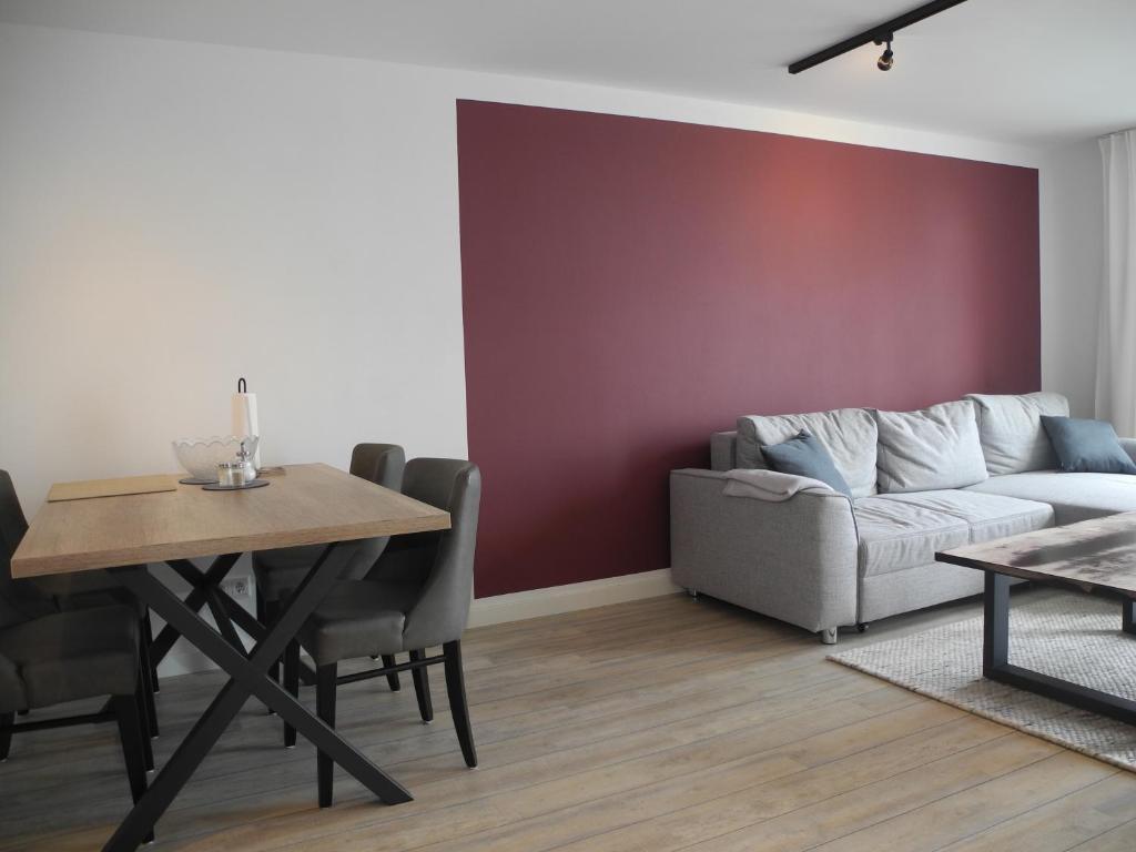 Posezení v ubytování Strandappartement Steinberghaff "Farborg" mit Meerblick