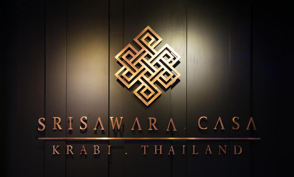 a sign for the sashavena cassis hotel at Srisawara Casa Hotel in Krabi town