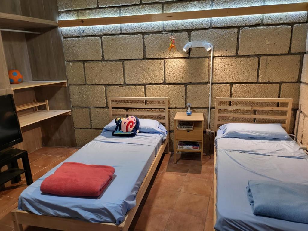 Posteľ alebo postele v izbe v ubytovaní Casa encima del Mar, parquing, 4 patios, idilico