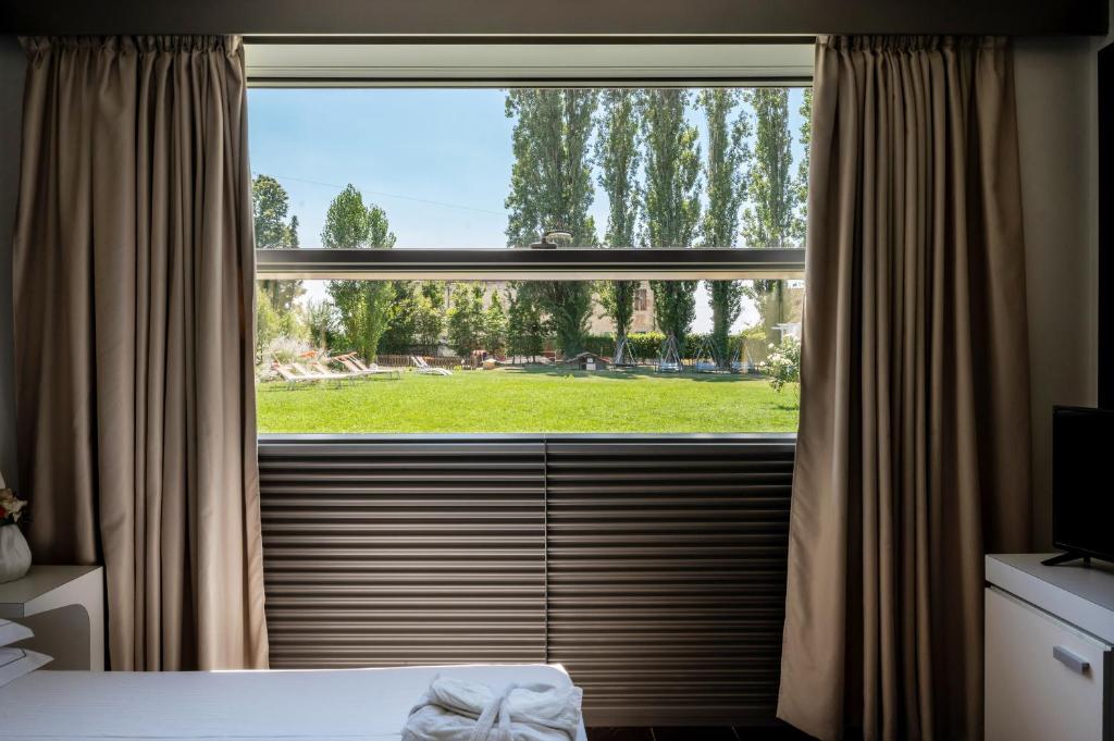 Postel nebo postele na pokoji v ubytování Best Western Hotel Green City