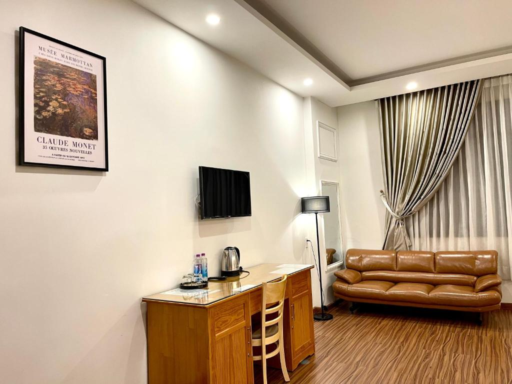 TV a/nebo společenská místnost v ubytování Tuan Long Da Lat Hostel