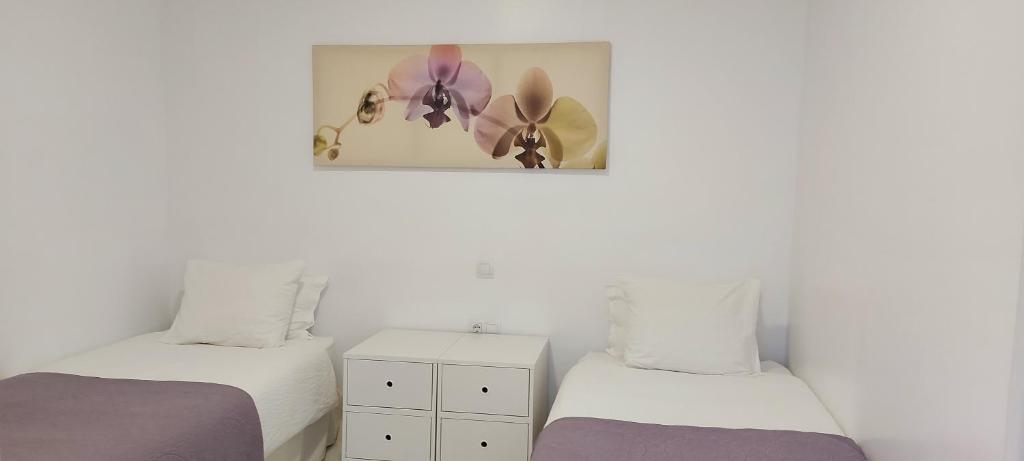 Posteľ alebo postele v izbe v ubytovaní Apartamento junto a la playa. Corralejo