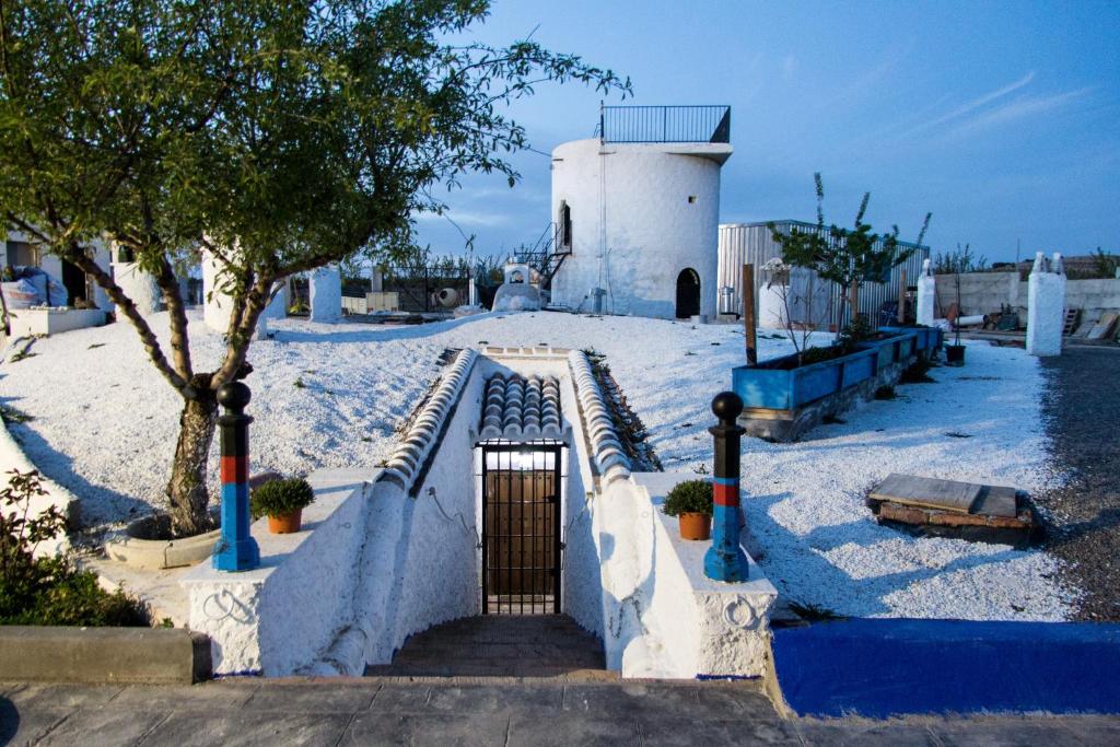 a staircase leading to a building in the snow at Silo el capricho in Madridejos