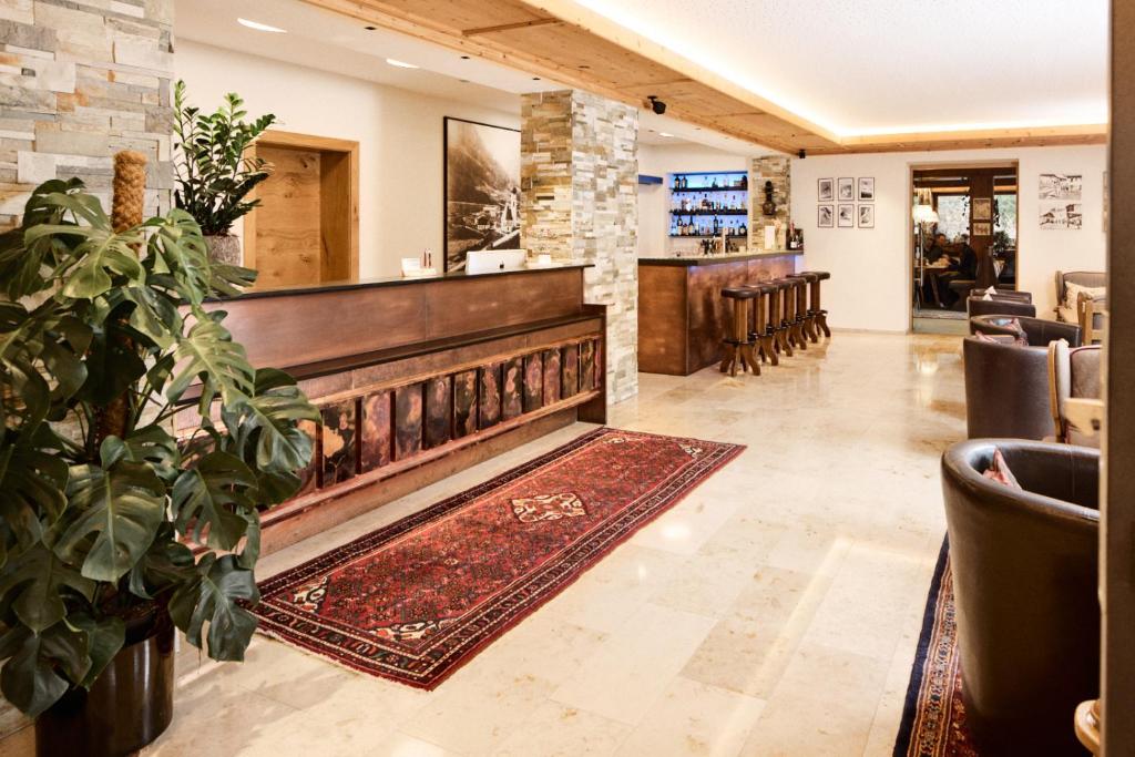 TV a/nebo společenská místnost v ubytování "Quality Hosts Arlberg" Hotel Garni Mössmer