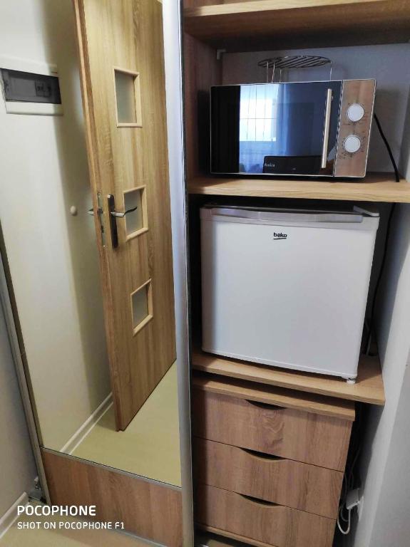 Kuchyňa alebo kuchynka v ubytovaní Studio pokój Dubaj Centrum Zakopane