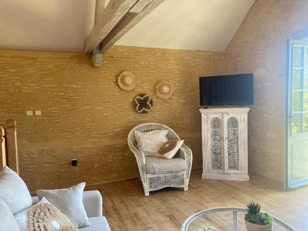 Część wypoczynkowa w obiekcie Logis des 4 fées et son bain nordique