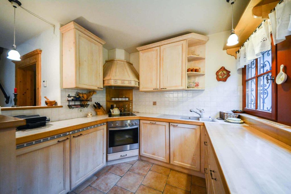 Kuchyň nebo kuchyňský kout v ubytování Villa Dona