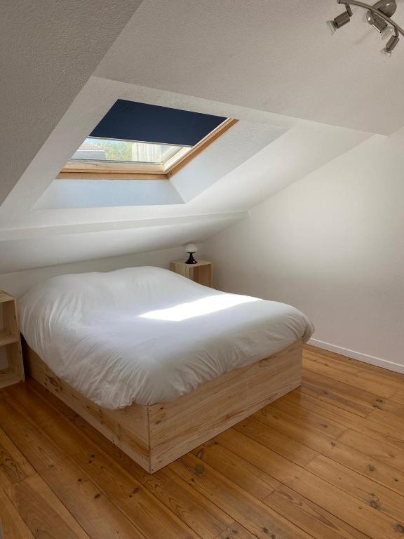 Posteľ alebo postele v izbe v ubytovaní T3 duplex5 hyper-centre climatisé