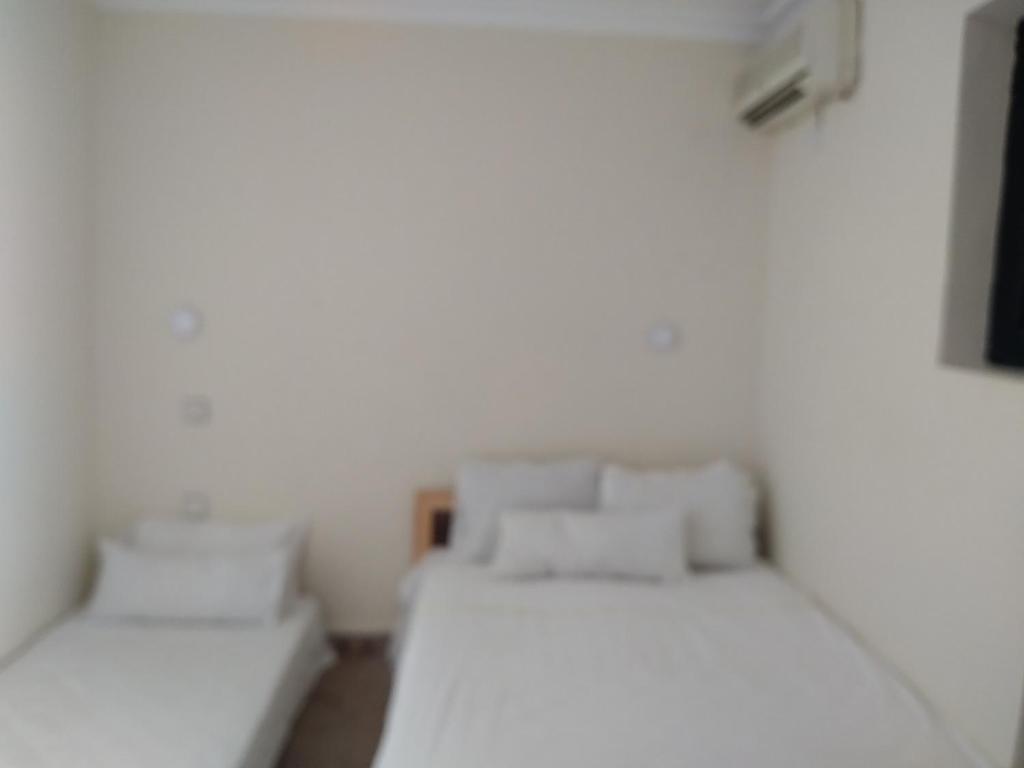 Postel nebo postele na pokoji v ubytování Riad 9 Derb El Bousnne