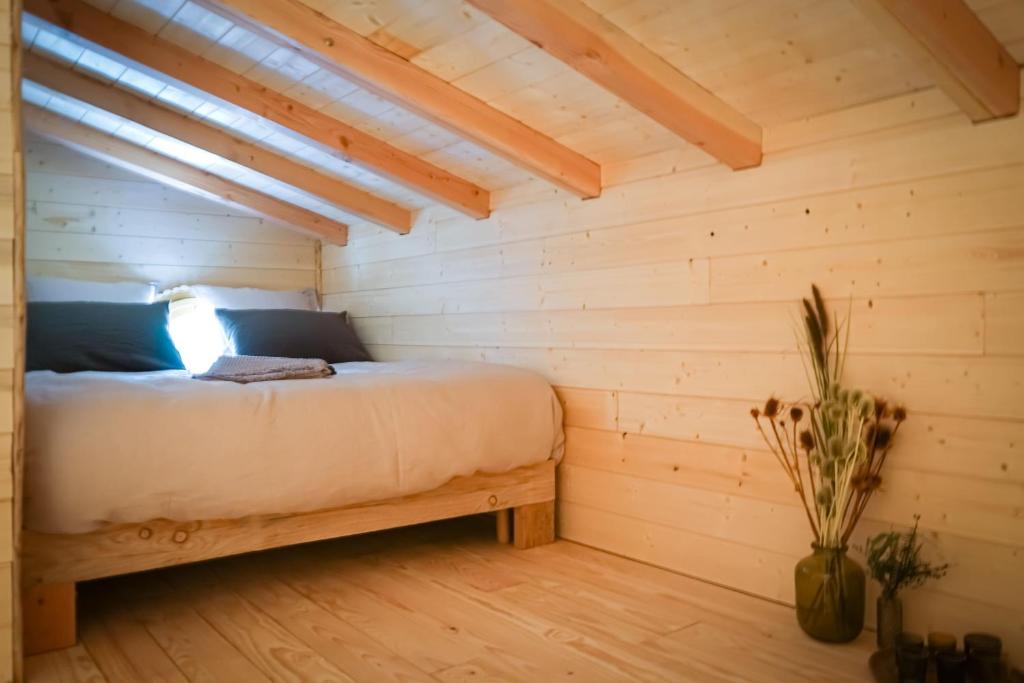 Postel nebo postele na pokoji v ubytování Au coeur de nos bois