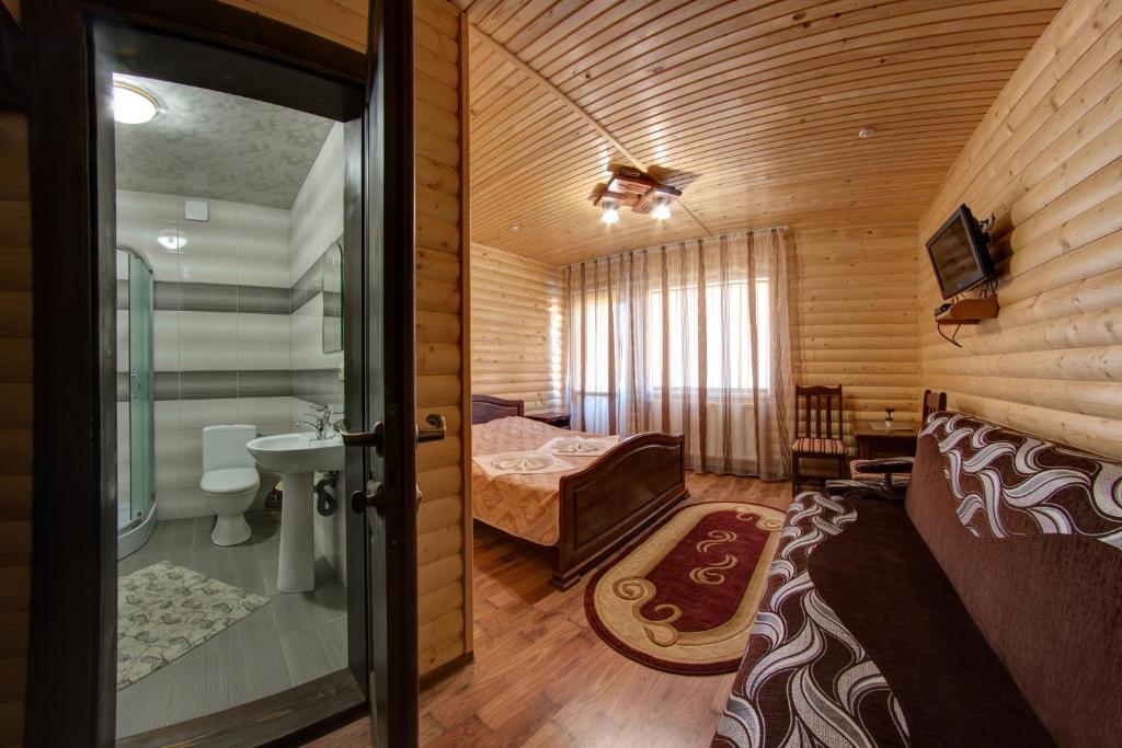 Postel nebo postele na pokoji v ubytování Villa Vlad & Spa