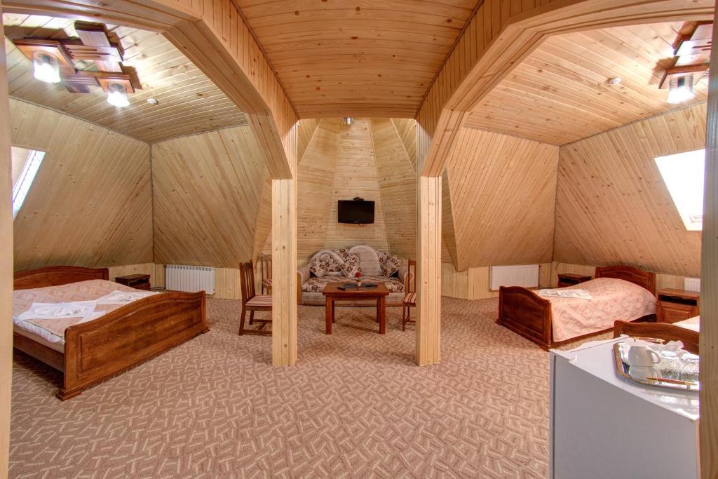Postel nebo postele na pokoji v ubytování Villa Vlad & Spa