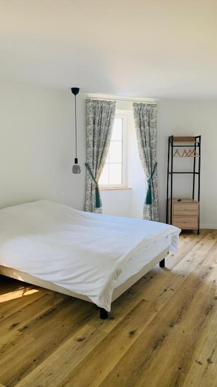 Postel nebo postele na pokoji v ubytování Chambres Vaugoubert