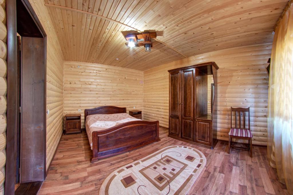Postel nebo postele na pokoji v ubytování Villa Vlad & Spa